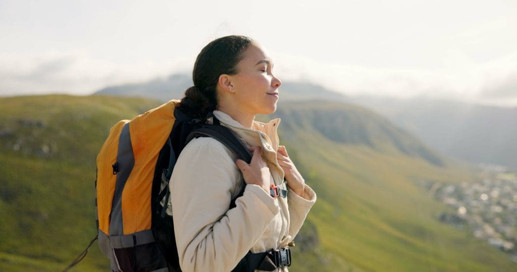 Young woman happy because of support for caregivers and  unpaid caregivers.